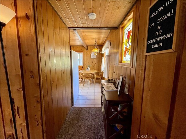 2076 8th Ln, Big Bear City, CA 92314 - hallway with wood ceiling, wood walls, and tile patterned flooring