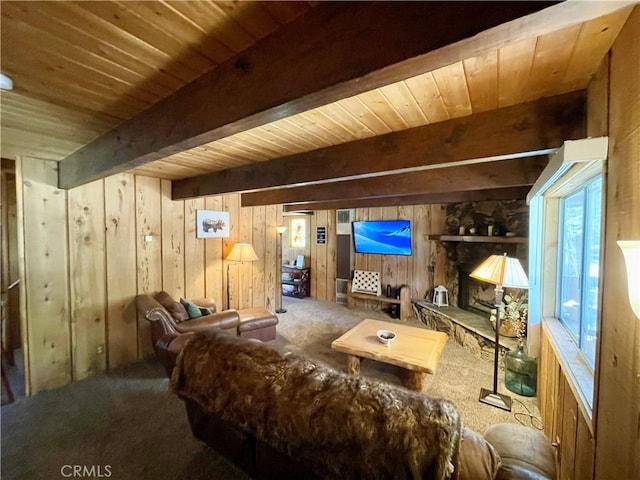2076 8th Ln, Big Bear City, CA 92314 - living room featuring wooden walls, carpet floors, and wooden ceiling with exposed beams