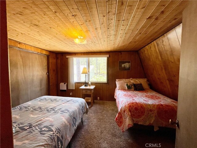 2076 8th Ln, Big Bear City, CA 92314 - carpeted bedroom with wooden ceiling and wooden walls