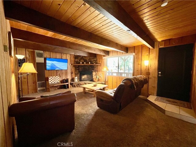 2076 8th Ln, Big Bear City, CA 92314 - carpeted living area with wooden walls, a stone fireplace, and wooden ceiling with exposed beams