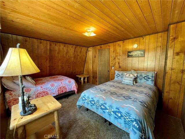2076 8th Ln, Big Bear City, CA 92314 - bedroom featuring carpet flooring, wood ceiling, and wooden walls