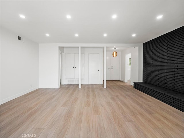 38537 Desert View Dr, Palmdale, CA 93551 - unfurnished living room featuring light wood-type flooring, recessed lighting, and baseboards
