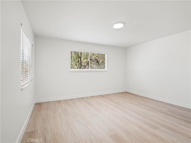 38537 Desert View Dr, Palmdale, CA 93551 - empty room with light wood-type flooring and baseboards