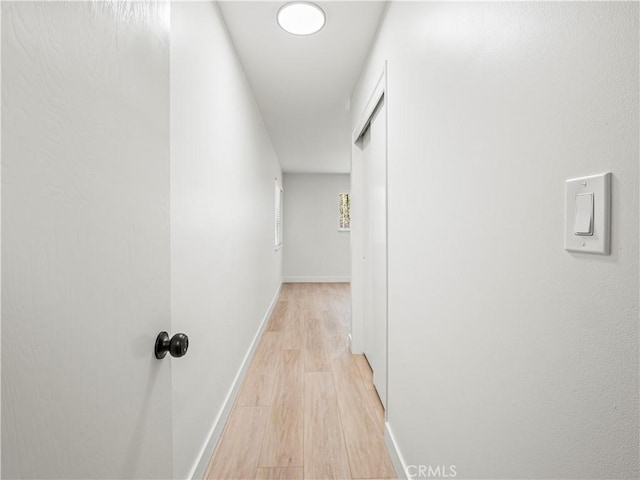 38537 Desert View Dr, Palmdale, CA 93551 - corridor featuring light wood finished floors and baseboards