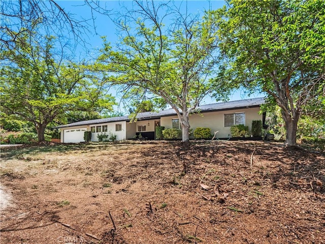 38537 Desert View Dr, Palmdale, CA 93551 - ranch-style house with stucco siding and a garage
