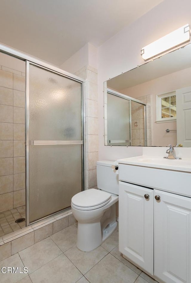 29421 Florabunda Rd, Canyon Country, CA 91387 - bathroom with toilet, a stall shower, vanity, and tile patterned flooring