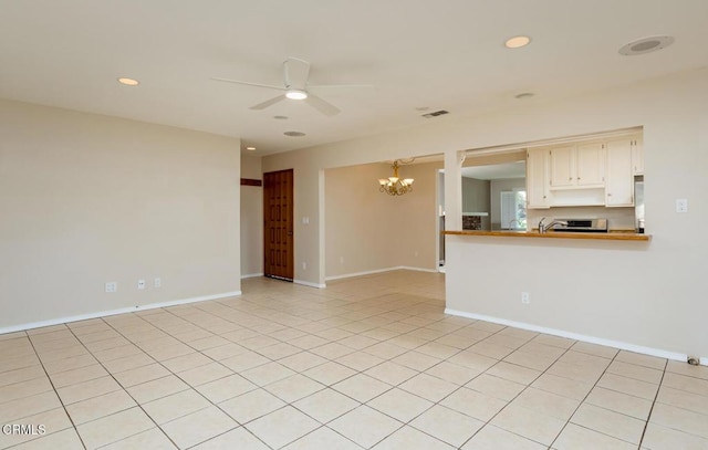 29421 Florabunda Rd, Canyon Country, CA 91387 - unfurnished living room featuring ceiling fan, a chandelier, recessed lighting, and baseboards