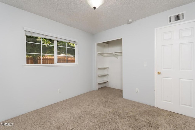 29421 Florabunda Rd, Canyon Country, CA 91387 - unfurnished bedroom with carpet floors, a closet, and a textured ceiling