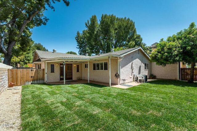 29421 Florabunda Rd, Canyon Country, CA 91387 - back of house with a patio, stucco siding, a gate, and central AC unit