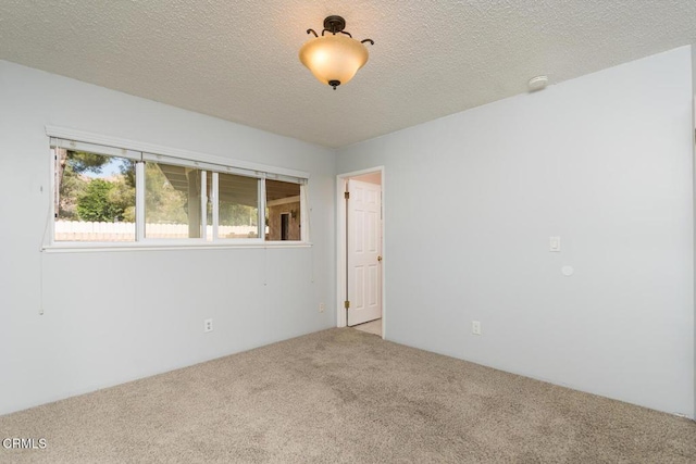 29421 Florabunda Rd, Canyon Country, CA 91387 - unfurnished room with carpet floors, a smoke detector, and a textured ceiling