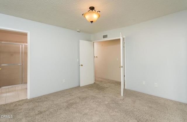 29421 Florabunda Rd, Canyon Country, CA 91387 - carpeted empty room with a textured ceiling