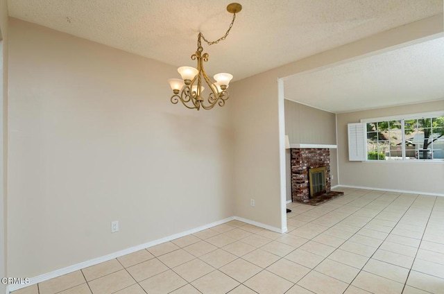 29421 Florabunda Rd, Canyon Country, CA 91387 - unfurnished living room featuring light tile patterned flooring, a chandelier, a textured ceiling, a fireplace, and baseboards