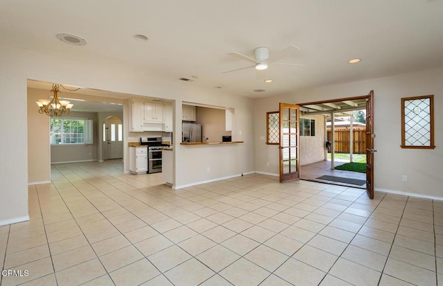 29421 Florabunda Rd, Canyon Country, CA 91387 - unfurnished living room featuring ceiling fan, a chandelier, light tile patterned floors, baseboards, and recessed lighting
