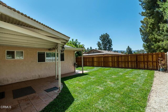 29421 Florabunda Rd, Canyon Country, CA 91387 - fenced backyard featuring a patio area
