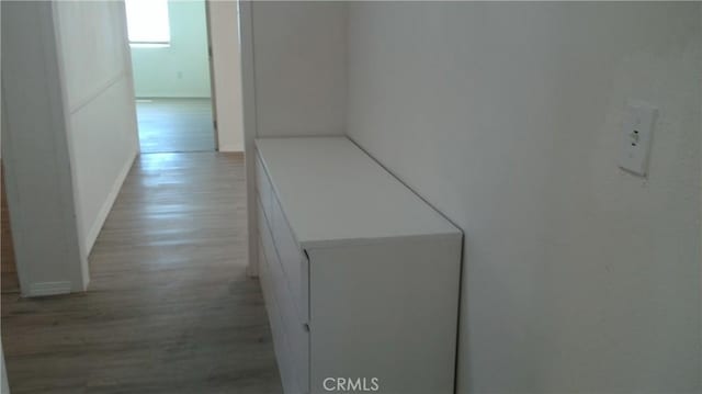 2420 Maine Ave, Long Beach, CA 90806 - hall featuring light wood-type flooring and baseboards