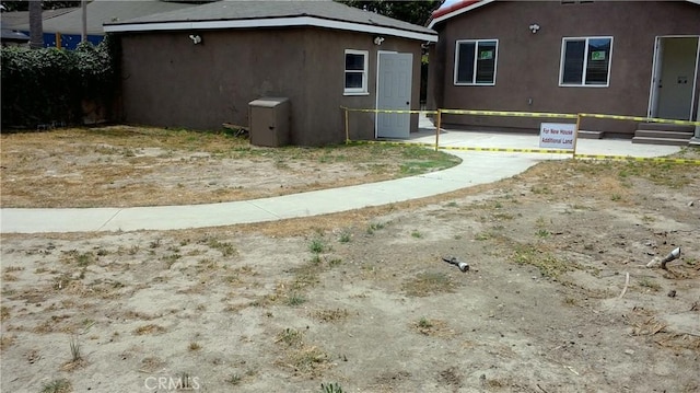 2420 Maine Ave, Long Beach, CA 90806 - view of side of home with stucco siding