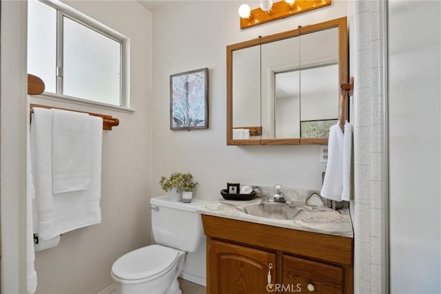 2661 San Jose St, Chico, CA 95973 - full bathroom with toilet, vanity, an enclosed shower, and baseboards