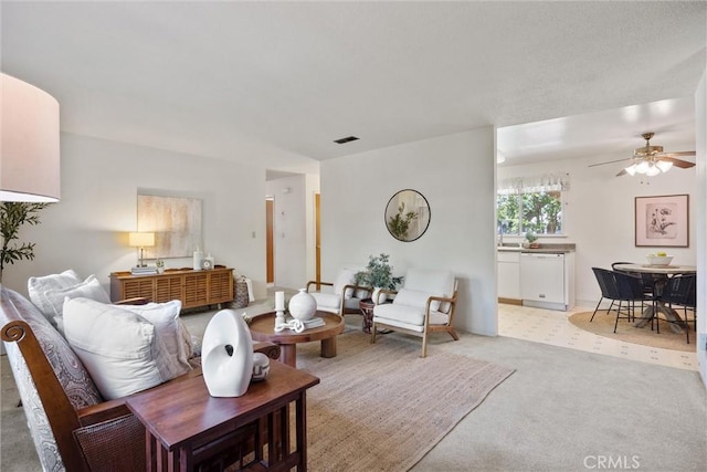 2661 San Jose St, Chico, CA 95973 - living room with light carpet and a ceiling fan