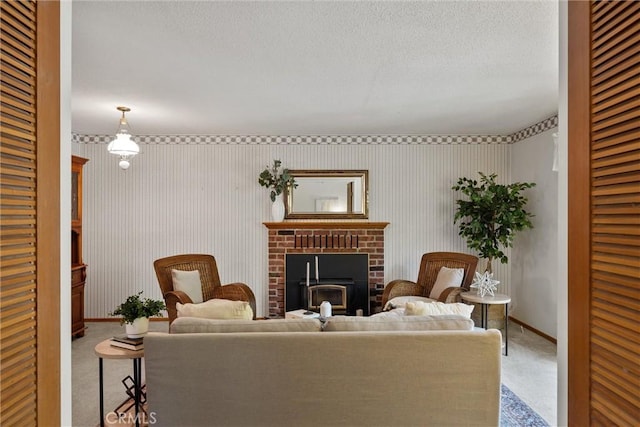 2661 San Jose St, Chico, CA 95973 - carpeted living area with a brick fireplace, baseboards, and a textured ceiling