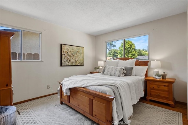 2661 San Jose St, Chico, CA 95973 - bedroom featuring baseboards and a textured ceiling