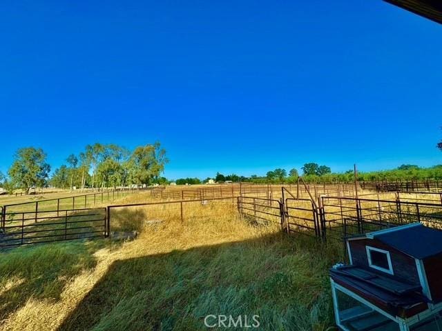 3646 Kirkwood Rd, Corning, CA 96021 - view of yard featuring a rural view and an enclosed riding area