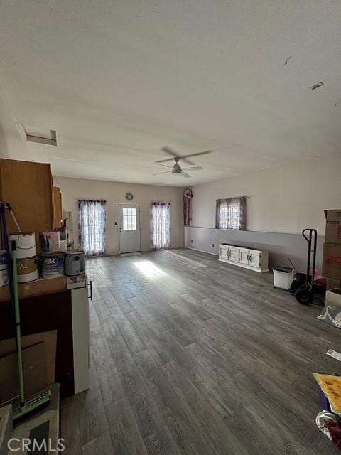 3646 Kirkwood Rd, Corning, CA 96021 - living area with dark wood-style flooring and ceiling fan