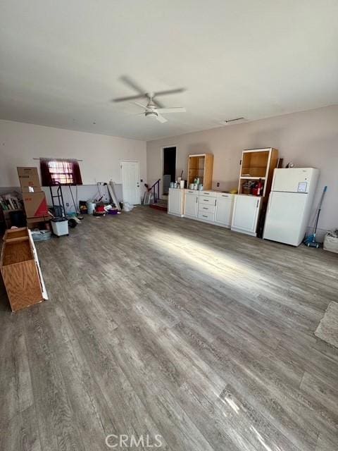 3646 Kirkwood Rd, Corning, CA 96021 - living area featuring wood finished floors and ceiling fan