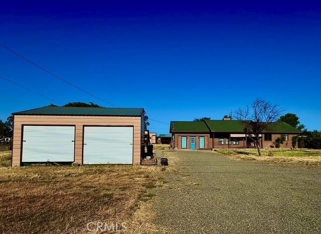 3646 Kirkwood Rd, Corning, CA 96021 - view of front of home with an outbuilding and a detached garage