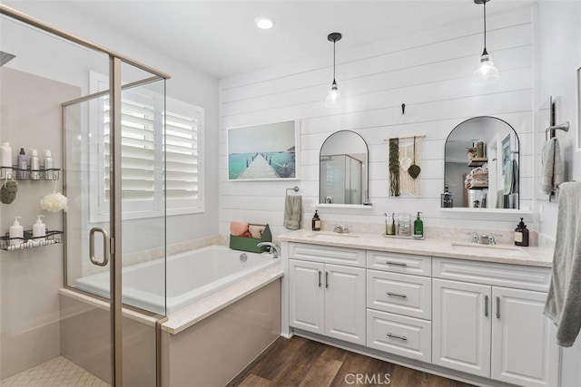 32954 Marin Fields Rd, Winchester, CA 92596 - bathroom with a bath, a stall shower, wood finished floors, and double vanity