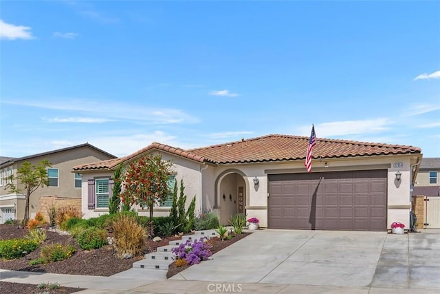 32954 Marin Fields Rd, Winchester, CA 92596 - mediterranean / spanish home with stucco siding, an attached garage, driveway, and a tiled roof