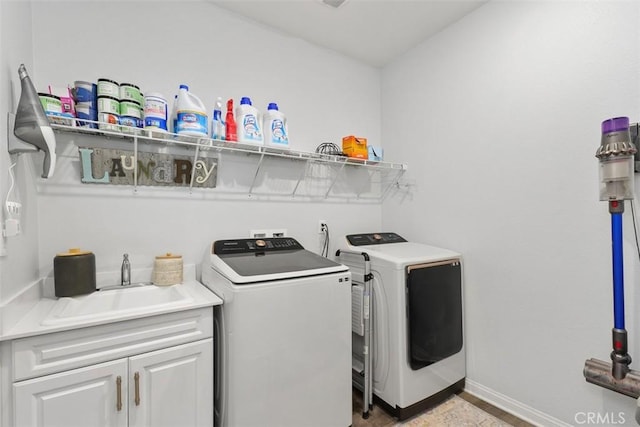 32954 Marin Fields Rd, Winchester, CA 92596 - laundry room featuring washer and dryer, baseboards, and cabinet space