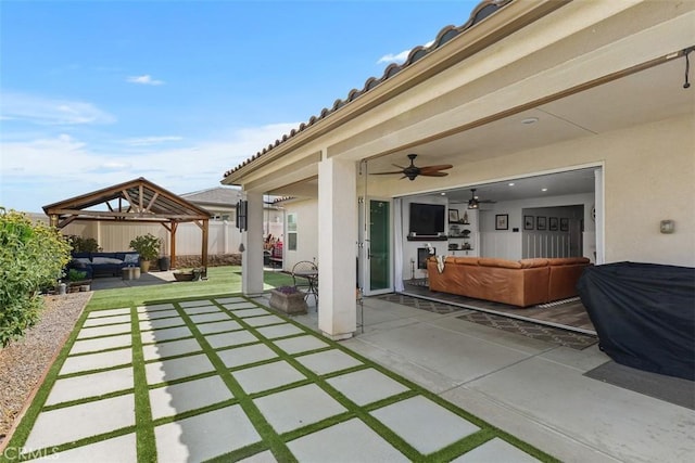 32954 Marin Fields Rd, Winchester, CA 92596 - view of patio featuring outdoor lounge area, a gazebo, and ceiling fan