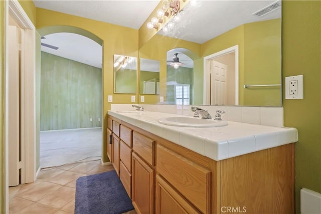 28445 Silverking Trl, Saugus, CA 91390 - bathroom with ceiling fan, double vanity, and tile patterned flooring