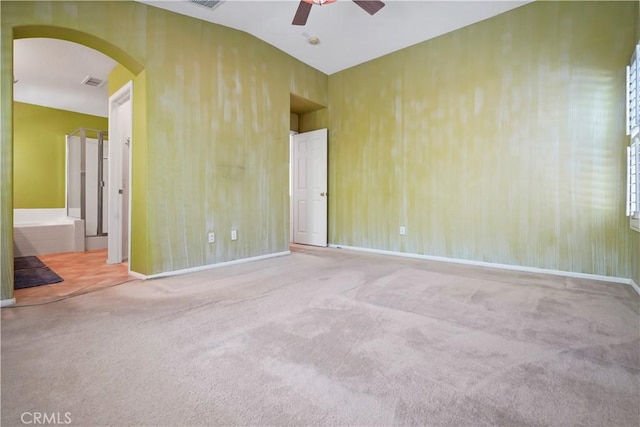 28445 Silverking Trl, Saugus, CA 91390 - carpeted empty room with ceiling fan and arched walkways