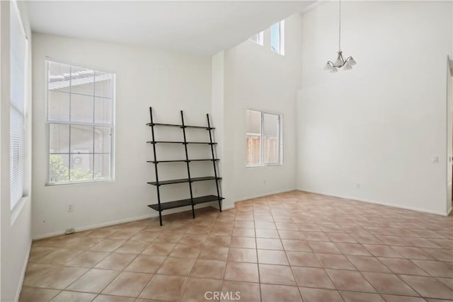 28445 Silverking Trl, Saugus, CA 91390 - spare room with light tile patterned flooring and a high ceiling