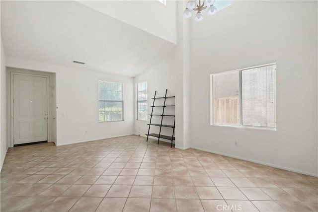 28445 Silverking Trl, Saugus, CA 91390 - spare room featuring light tile patterned floors and a high ceiling