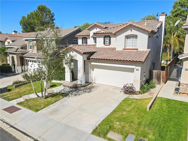 28445 Silverking Trl, Saugus, CA 91390 - mediterranean / spanish home featuring stucco siding, a tile roof, driveway, a gate, and an attached garage