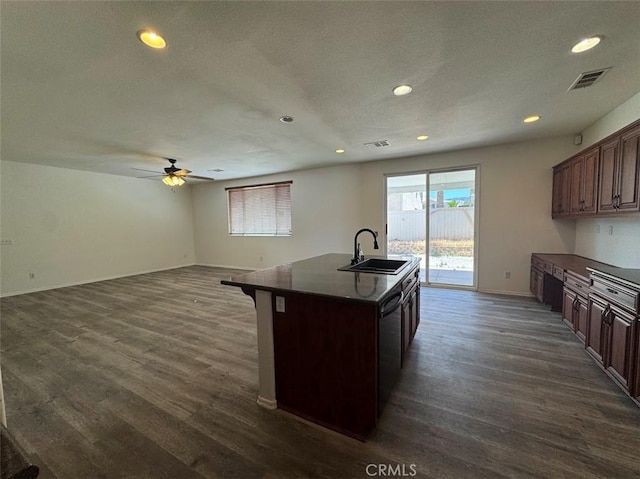 2306 Camellia St, Palmdale, CA 93551 - kitchen with a sink, dark countertops, ceiling fan, open floor plan, and dark wood-style flooring