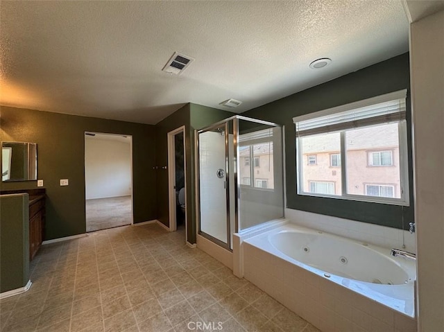 2306 Camellia St, Palmdale, CA 93551 - full bath featuring a stall shower, a whirlpool tub, a textured ceiling, vanity, and baseboards