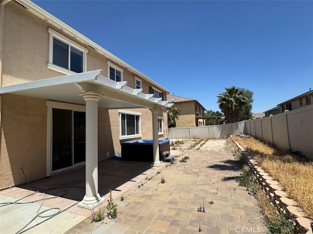 2306 Camellia St, Palmdale, CA 93551 - fenced backyard with a hot tub and a patio