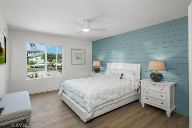 16791 Glenhaven Ln, Huntington Beach, CA 92647 - bedroom with wood finished floors, baseboards, and ceiling fan