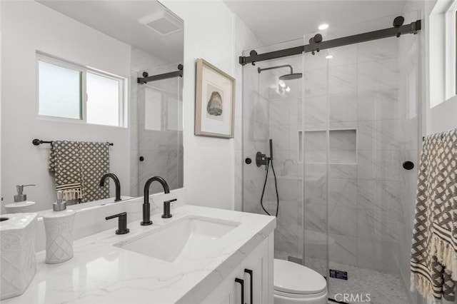 16791 Glenhaven Ln, Huntington Beach, CA 92647 - bathroom featuring vanity, toilet, and a shower stall