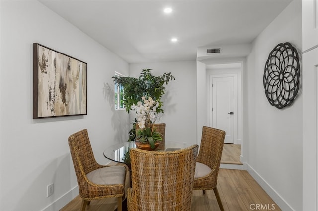 16791 Glenhaven Ln, Huntington Beach, CA 92647 - dining area with baseboards, wood finished floors, and recessed lighting