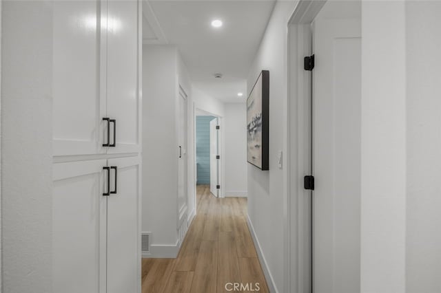 16791 Glenhaven Ln, Huntington Beach, CA 92647 - corridor with light wood-type flooring, recessed lighting, and baseboards