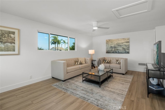 16791 Glenhaven Ln, Huntington Beach, CA 92647 - living room with attic access, wood finished floors, baseboards, and a ceiling fan
