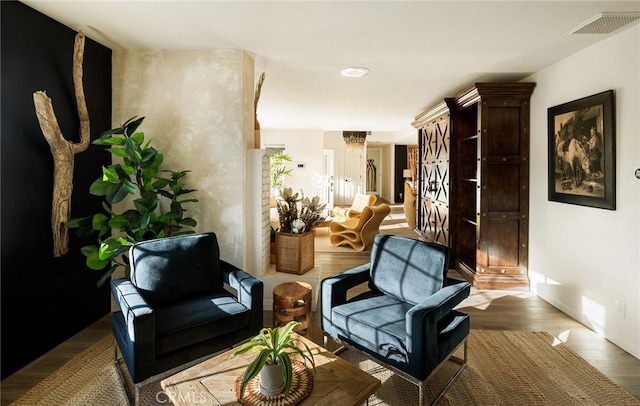 58916 Carmelita Cir, Yucca Valley, CA 92284 - sitting room with wood finished floors, baseboards, and a chandelier