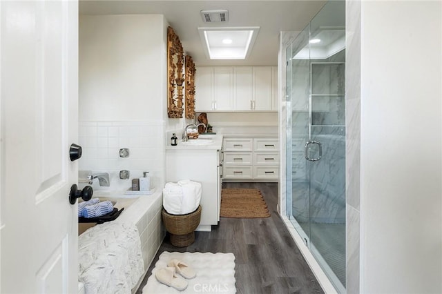 58916 Carmelita Cir, Yucca Valley, CA 92284 - full bathroom featuring vanity, a shower stall, and wood finished floors