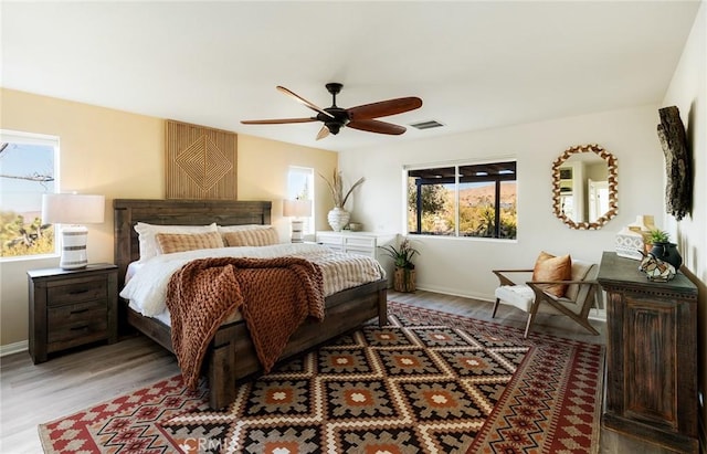 58916 Carmelita Cir, Yucca Valley, CA 92284 - bedroom featuring light wood finished floors, baseboards, and a ceiling fan