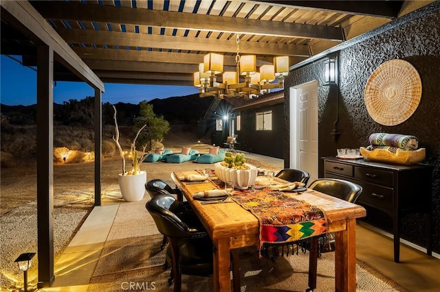 58916 Carmelita Cir, Yucca Valley, CA 92284 - dining area featuring a chandelier and wood ceiling with exposed beams