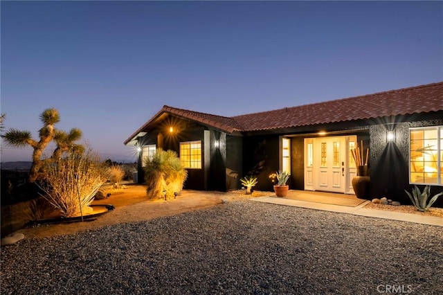 58916 Carmelita Cir, Yucca Valley, CA 92284 - view of front of house with a tiled roof and stucco siding
